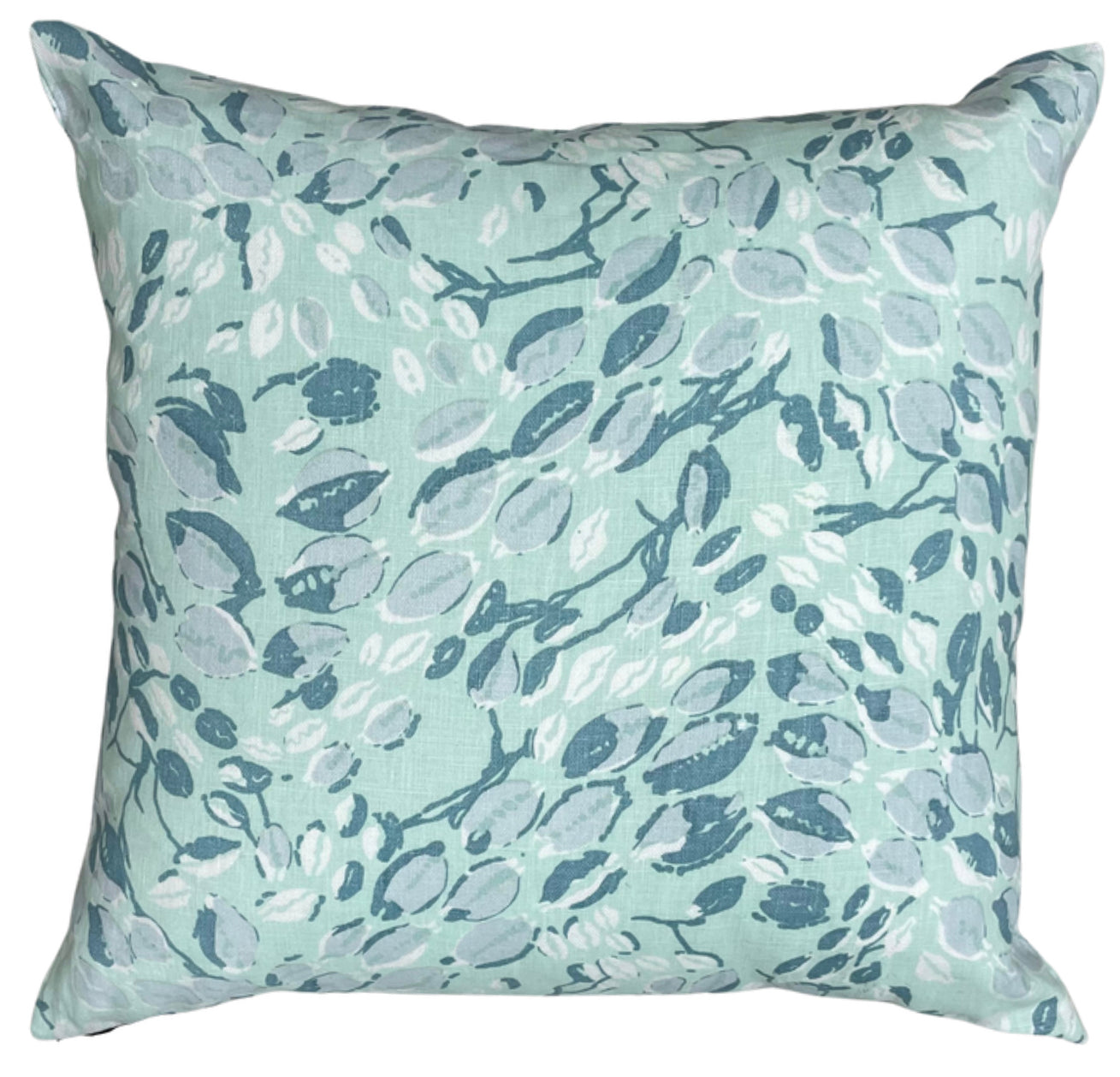 Decorative pillow with floral pattern on a light blue background